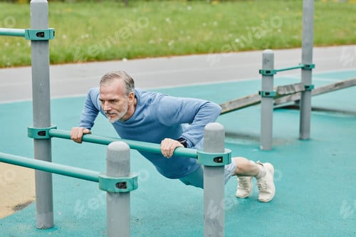 Preview: Strong Senior Man Working Out Outdoors