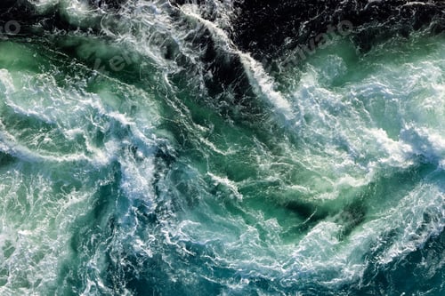 Preview: Blue waves of water of the river and the sea meet each other during high tide and low tide.