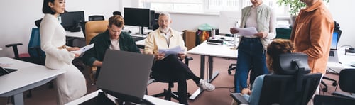 Preview: Group of businesspeople in modern workshop