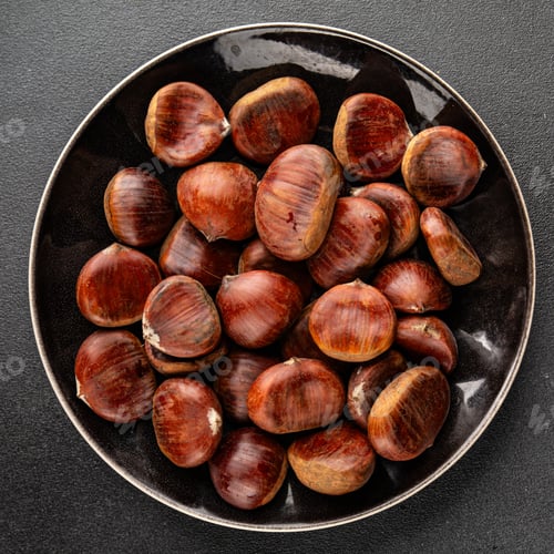 Preview: Edible chestnuts delicious treat tasty snack fresh gourmet food background on table