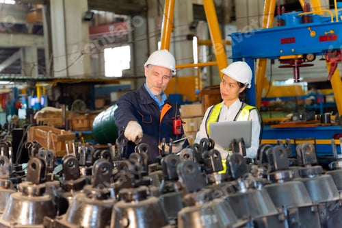 Preview: A businessman maintenance work at an old factory