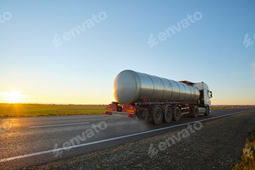 Preview: Petrol cargo truck driving on highway hauling oil products. Delivery transportation and logistics