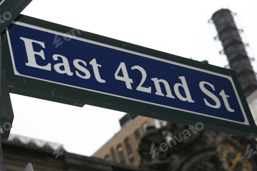Preview: Low angle shot of the sign of the east 42nd Street against the clear sky