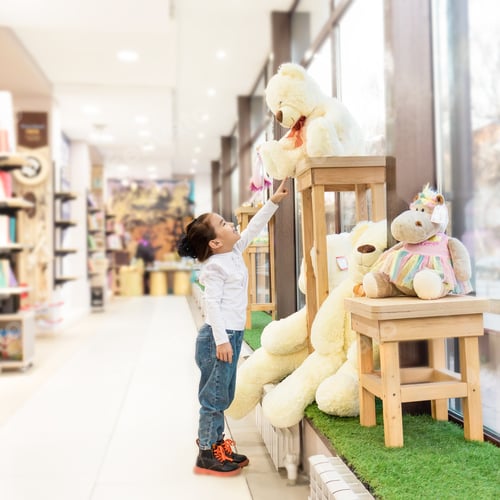 Preview: children in a toy store. Selective focus.