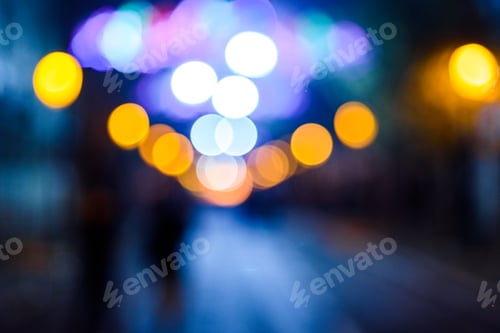 Preview: Defocused urban night background with colorful circles.