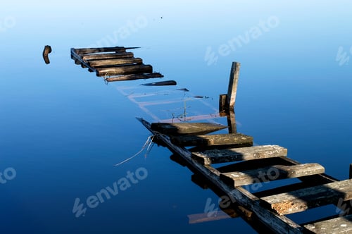 Preview: Wooden jetty immersed in bright blue water