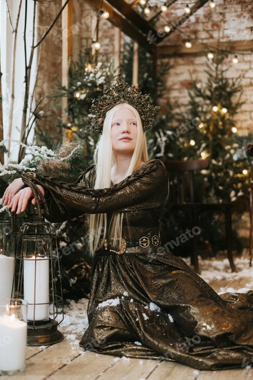 Preview: young albino woman with blue eyes and long white hair in beautiful green dress and crown stands in l