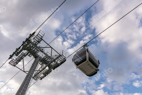 Preview: Low angle shot of cableway on a sky background