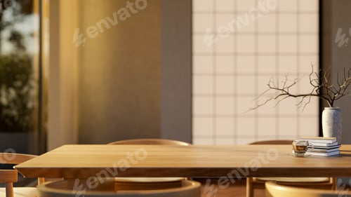 Preview: Coffee in glass cup with book and vase on wooden dining table with armchairs in warm sunlight