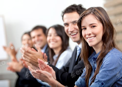 Preview: Business Team Clapping A Good Presentation In An Office