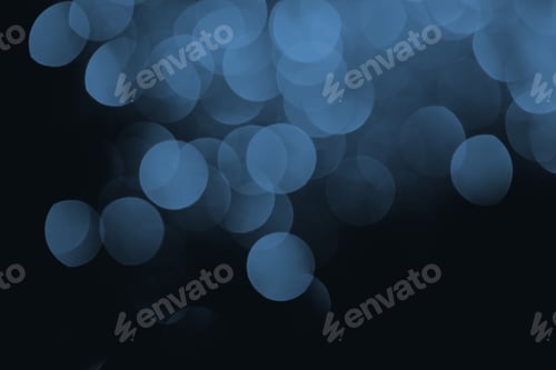 Preview: blue festive bokeh on black background for holiday