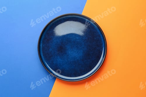 Preview: One stylish plate on color background, top view
