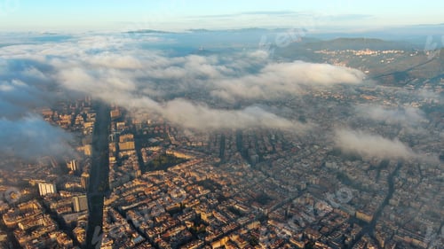 Preview: Aerial view of Barcelona City above the clouds and fog, Catalonia, Spain