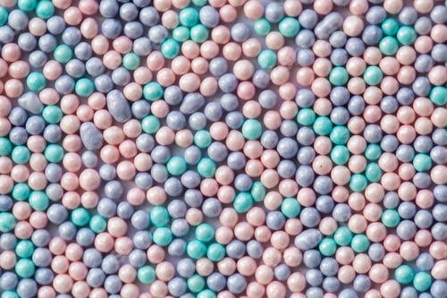 Preview: Sugar sprinkle dots, decoration for confectionery. High magnification macro