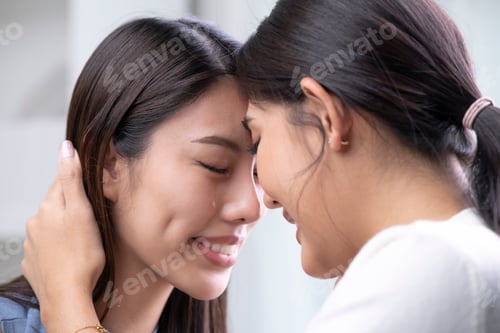 Preview: Beautiful young Asian lesbian couple.