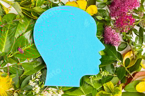 Preview: Papercut head with green leaves and flowers. Mental health, emotional wellness, contented emotions