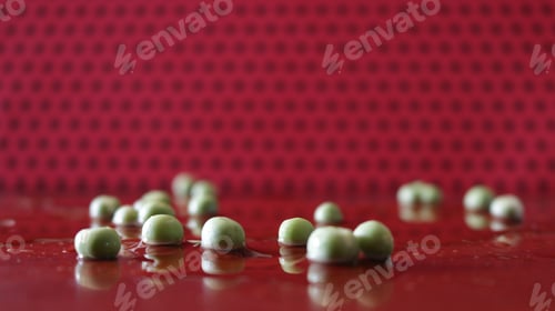 Preview: Closeup shot of mung beans on a red background