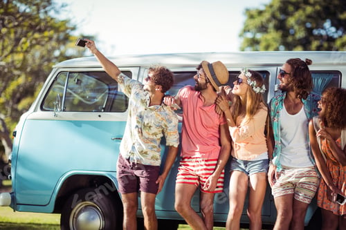 Preview: Group of friends taking selfie from mobile phone
