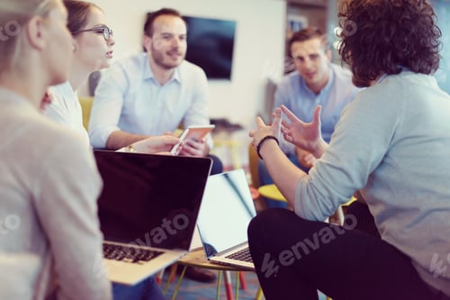 Preview: Startup Business Team At A Meeting at modern office building