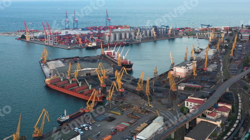 Preview: Aerial view of sea port with ships and containers.