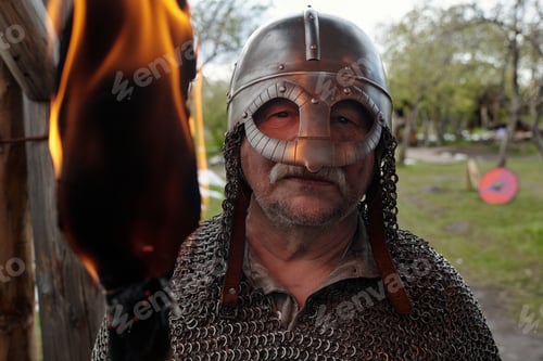 Preview: Wearing Medieval Chainmail Suit and Metal Helmet with Flame