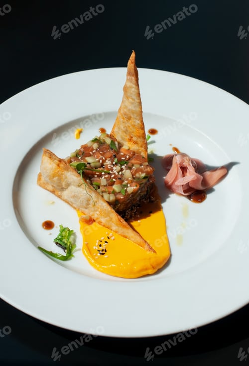 Preview: Close up of salmon tartare with teriyaki and fattoush bruschetta