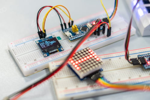 Preview: close up person work on silicon chip or microcontoller b