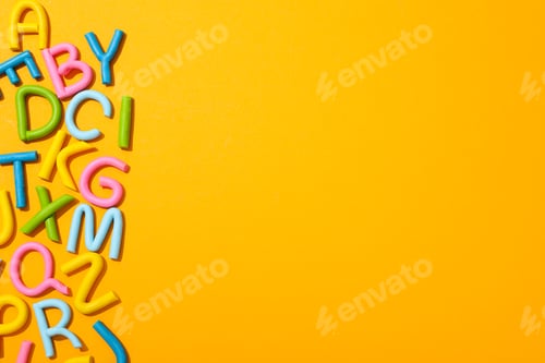 Preview: Alphabet made of colored plasticine on a light background.