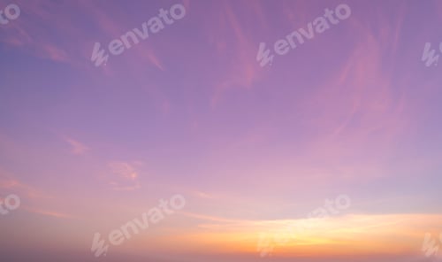 Preview: Sunset sky. Abstract nature background. Dramatic blue and orange, colorful clouds at twilight time.
