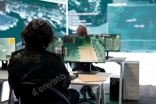 Preview: IT operator monitoring surveillance radar footage from CCTV system