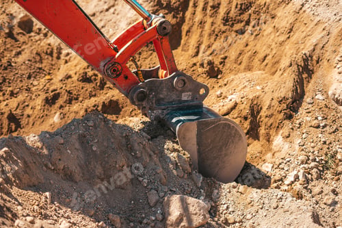 Preview: Excavator shovel digging on dirt