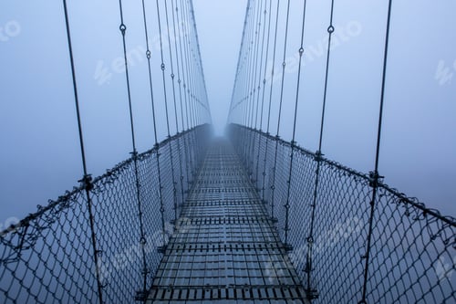 Preview: Foggy winter morning and a suspension bridge.