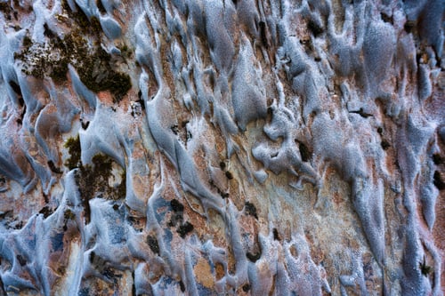 Preview: Abstract weathered rocky limestone mountain cave with lichen surface