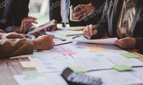 Preview: Financial analysts analyze business financial reports on a digital tablet planning investment projec