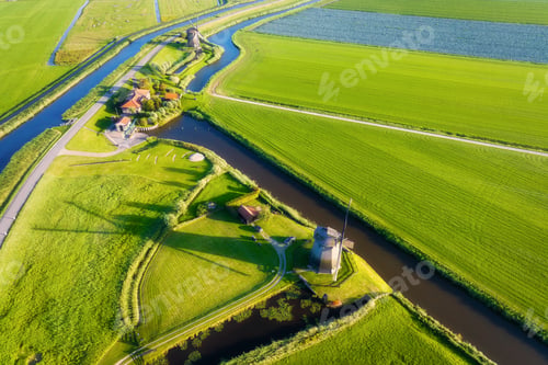 Preview: Windmills on the banks of canals. Agricultural fields and pastures.