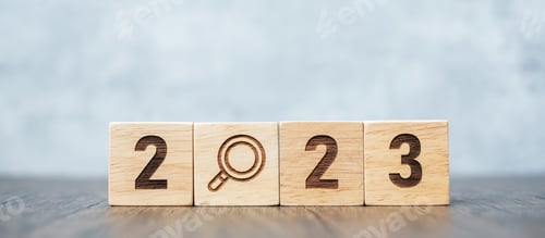 Preview: 2023 block with magnifying glass icon.