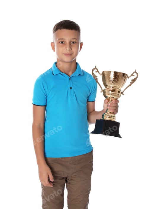 Preview: Happy boy with golden winning cup on white background