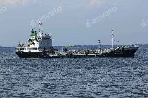 Preview: Large tanker anchored in the sea.
