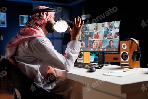 Preview: Muslim guy conducting an online meeting