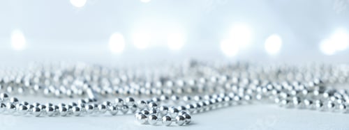 Preview: Banner. New year and Christmas background with silver garlands with lights with bokeh in blur.