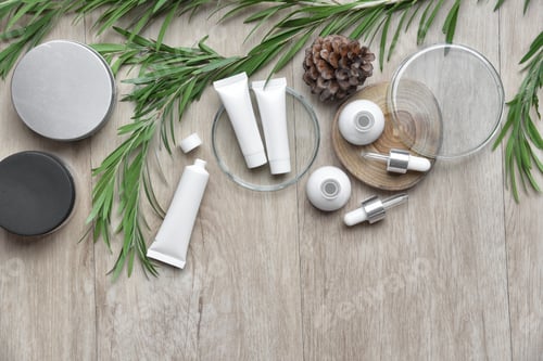 Preview: Cosmetic bottle containers packaging with green herbal leaves