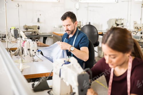 Preview: Workers sewing on a textile factory