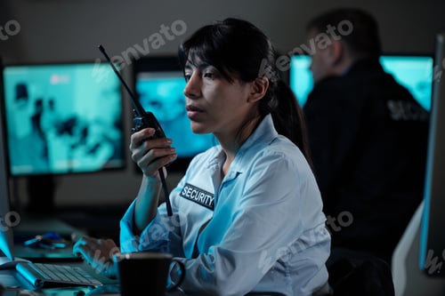 Preview: Security guard using walkie-talkie