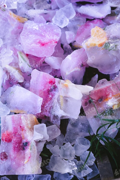 Preview: Fresh berries and fruits frozen in ice cubes