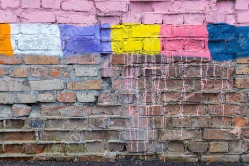 Preview: The Old Textured Surface Of A Brick Wall With Multicolored Spots For Vintage Background Or For