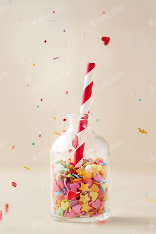 Preview: Colorful heart and star sprinkling in a little bottle with striped red and white straw