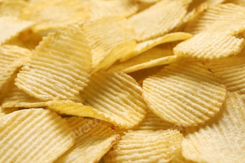 Preview: Pile of crispy potato chips as background, closeup