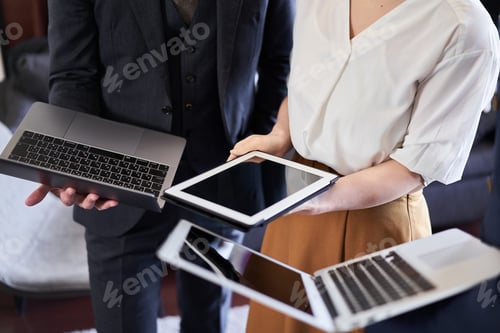 Preview: Asian business person expanding digital gadgets
