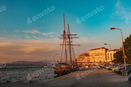 Preview: Sailboat by sea at sunset