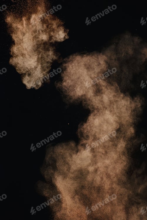 Preview: Cocoa powder explosion in motion. Chocolate dust on a black background. Action food photography.